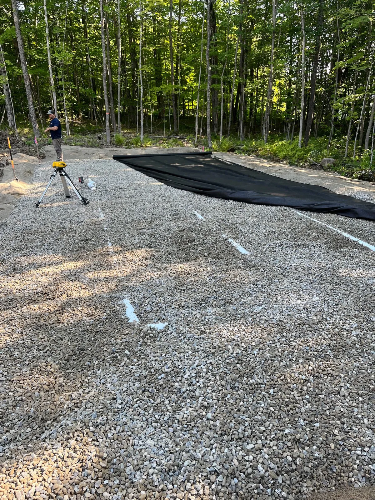 Completed earthwork and grading on a residential property.